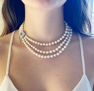 Fresh water Pearls Necklace with Diamonds and green Emerald clasp