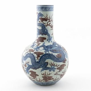 CHINESE BLUE & WHITE BOTTLE VASE WITH IRON RED