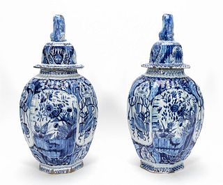 PAIR, DELFTWARE LIDDED URNS WITH LION FORM FINIALS