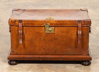 ENGLISH BARONET'S LEATHER TRUNK ON STAND, C. 1910
