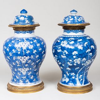 Near Pair of Gilt-Metal-Mounted Chinese Blue and White Porcelain Jars and Covers