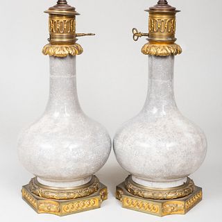 Pair of Louis XVI Style Ormolu-Mounted Chinese White Crackle Glazed Porcelain Bottle Vases Mounted as Lamps