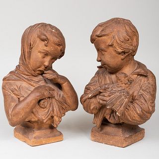 Two Continental Painted Earthenware Busts of Children