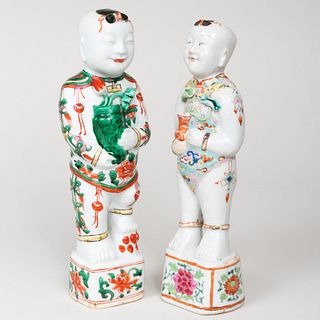 Two Chinese Porcelain Models of Boys