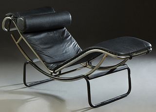 Corbusier Style Mid Century Modern Recliner, 20th c., with black leather covering on a chrome frame over an ebonized iron base, H.- 34 in., W.- 62 in.
