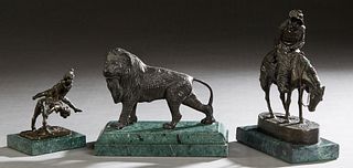 Three Cabinet Bronzes, 20th c., on green marble bases, one of a standing lion; one after Antoine Barye(1796-1875) of two boys playing leapfrog; and af