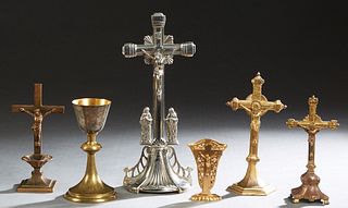 Six Religious Items, 20th c., consisting of four table crucifixes, a diminutive altar vase, and a brass communion chalice, Largest Crucifix- H.- 13 3/