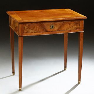 French Provincial Louis XVI Style Ormolu Mounted Carved Cherry Writing Table, late 19th c, the rectangular top over a frieze drawer, on tapered square