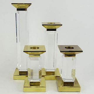 Charles Hollis Jones Four (4) Piece Suite of Pedestal Style, Beveled Lucite and Brass Candlesticks.