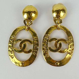 Large Pair of Chanel, Made in France Gold Tone Logo Earrings.
