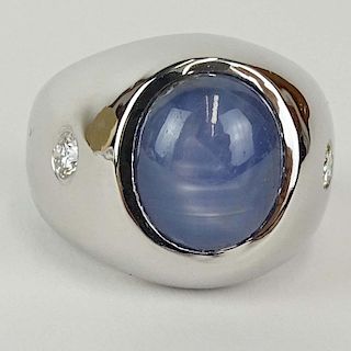 Man's Vintage Approx. 12.01 Carat Star Sapphire, .50 Carat Round Cut Diamond and 14 Karat White Gold Ring.