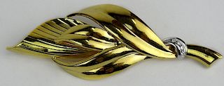 Lady's Vintage 18 Karat Yellow Gold Leaf Brooch with Small accent Diamonds. Signed 750.