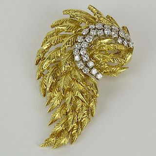Lady's Vintage Approx. 1.10 Carat Round Cut Diamond and 14 Karat Yellow Gold Articulated Branch Brooch.