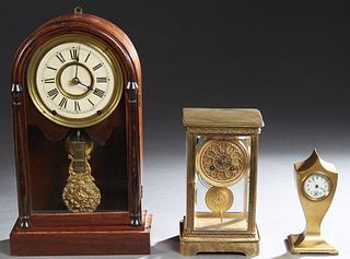 Group of Three American Mantel Clocks, early 20th c., consisting of a gilt brass and beveled glass Anniversary clock, by Japy Freres; and a Seth Thoma