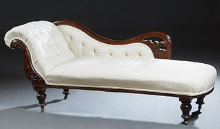 American Carved Walnut Recamier, late 19th c., the pierced scrolling back rail over a tufted back and tufted scrolled arm, now in white upholstery, H.