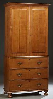 English Carved Oak Linen Press, late 19th c., the stepped sloping crown over double fielded panel doors enclosing three sliding shelves, on a base wit