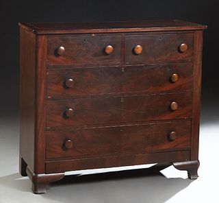 American Carved Mahogany Chest, mid 19th c., the rounded corner top over two frieze drawers and three deep drawers, on a plinth base on ogee block fee