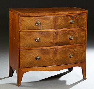 English Georgian Style Carved Mahogany Bowfront Chest, 19th c., the banded top over two convex frieze drawers, and two convex deep drawers, on bracket