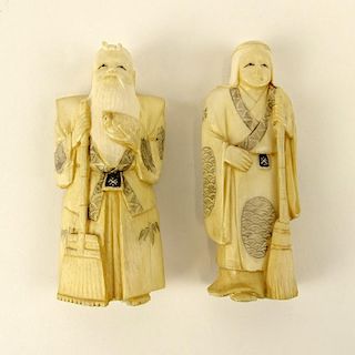 Two (2) Japanese carved Ivory Figures.