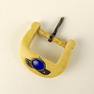 Carved Ivory Belt Buckle with Silver and Lapis Lazuli Accents.