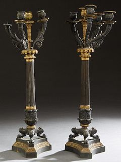 Pair of Empire Style Patinated and Gilt Bronze Six Light Candelabra, 19th c., with five patinated acanthine curved arms around a straight central gilt