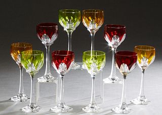 Set of Ten Nachmann Cut Crystal Colored Wine Hocks, 20th c., three green, three amber, and four ruby, on cut crystal stems to hexagonal bases, H.- 8 1
