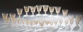 Set of Twenty-Six Pieces of Gilt Decorated Stemware, early 20th c., consisting of 14 red wines, and 12 white wines with paneled sides, together with 2
