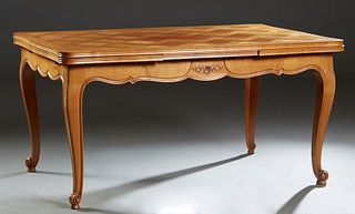 French Louis XV Style Oak Draw Leaf Dining Table, 20th c., the serpentine parquetry basket weave inlaid top over a scalloped skirt, on carved cabriole