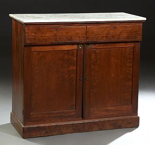American Carved Mahogany Marble Top Sideboard, 19th c., the figured white marble over two frieze drawers above double cupboard doors, on a plinth base