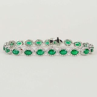 Lady's Approx. 11.0 carat Oval Cut Emerald, 3.75 Carat Round Cut Diamond and 18 Karat White Gold Bracelet.
