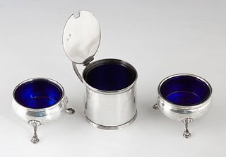 Three Sterling Pieces, consisting of a Georgian mustard pot, London, 1790, by Peter and John Bateman, with a cobalt glass liner; together with a match