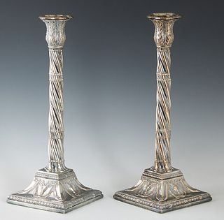 Pair of English Silverplated Copper Single Candlesticks, 19th c., with relief bobeches on a relief acanthus leaf candle cup, on a twisted support, to 