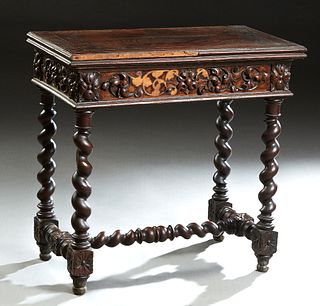 French Louis XIII Style Carved Oak Games Table, c. 1880, the swiveling top opening to an inset leather gaming surface, over a floral and scroll carved