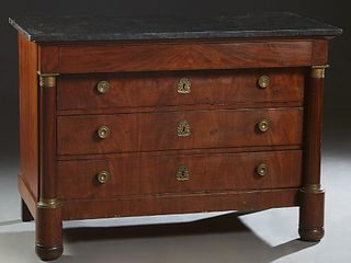 Exceptional French Empire Style Carved Walnut Marble Top Commode, mid 19th c., the figured black marble over a frieze drawer and three setback drawers
