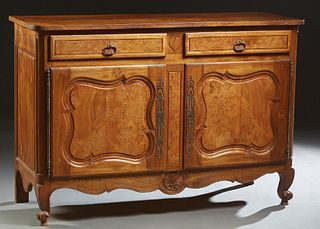 French Provincial Carved Elm Louis XV Style Sideboard, early 20th c., the rounded corner top over two frieze drawers flanking a relief carved heart, a