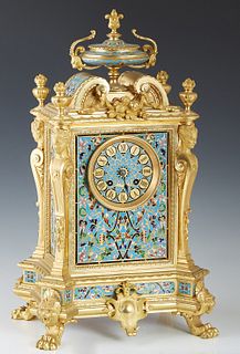 French Louis XVI Style Gilt Bronze and Cloisonne Mantle Clock, 20th c., with an urn surmount over a cloisonne face time and strike clock by Japy Frere