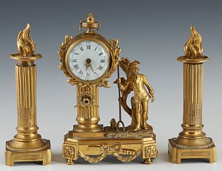 Diminutive Three Piece French Gilt Bronze Clock Set, early 20th c., by Charles Hour, consisting of a figural drum clock, time only, with an urn surmou