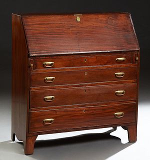 American Carved Inlaid Mahogany Slant Front Desk, early 19th c., the slant lid opening to an interior fitted with cubbyholes, drawers, and a central c