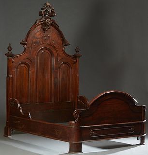 American Victorian Carved Rosewood High Back Double Bed, c. 1870, possibly New Orleans, originally a half tester, the arched headboard with an elabora