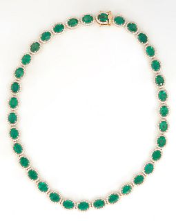 14K White Gold Link Necklace, each of the 35 links with prong set oval emerald atop a border of round diamonds, total emerald weight- 40.23 cts., L.- 