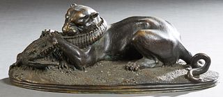 Jules Moignez (1835-1894), "Panther and Crocodile Struggle," 20th c., patinated bronze, on an integral stepped oval base, signed on one side of the ba