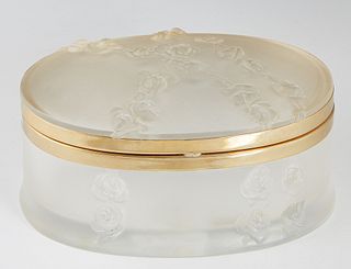 Lalique Frosted Crystal Dresser Box, 20th c., of oval form, with relief floral decoration, the bottom with an etched signature "Lalique, France, 500,"
