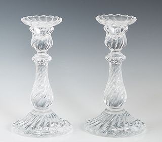 Pair of Baccarat Crystal Candlesticks, 20th c, the scalloped top over a tapered swirled support, to a swirled circular base, H.- 9 1/8 in., Dia.- 4 7/