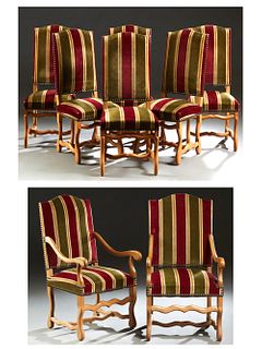 Set of Eight French Provincial Louis XIII Style Carved Beech Highback Dining Chairs, 20th c., consisting of six side chairs and two fauteuils, the arc