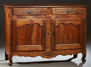 French Provincial Louis XV Style Carved Cherry Sideboard, 19th c., the stepped canted corner top over two frieze drawers above double cupboard doors w