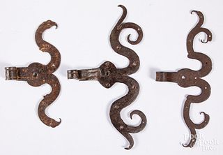 Three wrought iron rams horn hinges