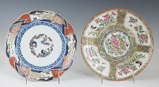 Two Chinese Porcelain Plates, 19th c., one Rose Medallion with panel decorations of birds and flowers; the second Arita with a scalloped rim and geome