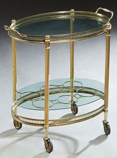 French Louis XVI Style Brass Plated Iron Dessert Cart, 20th c., the top with a removable galleried tray, over a bottle rack, on reeded supports to lar