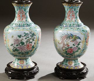Pair of Oriental Enamel Baluster Vases, late 19th c., with floral and dragon decoration, now on carved ebonized bases and wired as lamps, H.- 18 in., 