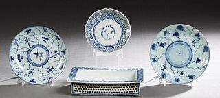 Four Pieces of Chinese Blue and White Porcelain, 19th c., consisting of a circular bowl, a pair of plates stamped on the bottom, and a Bonsai planter 